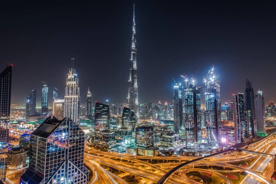 a cityscape of Dubai with the prominent Burj Khalifa in the middle