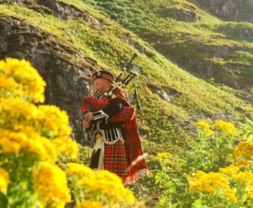 man with bagpipes in the field