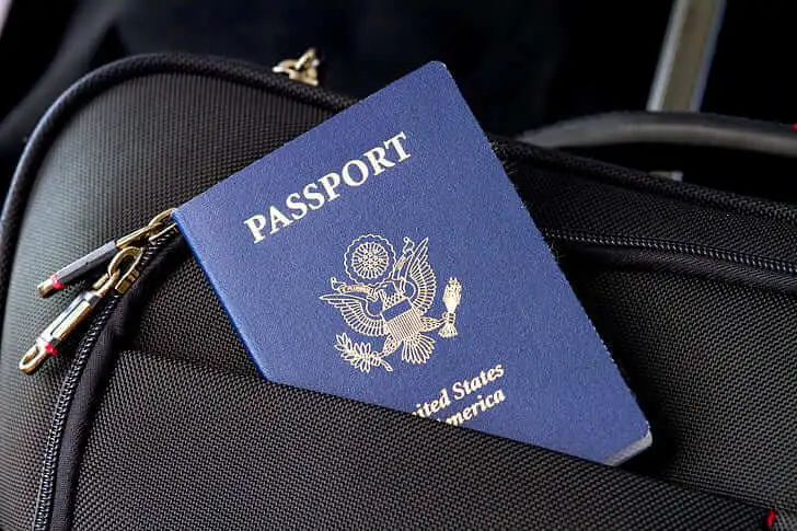 A new passport in a suitcase for those who want to relocate
