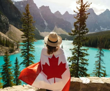 girl holding a canadian flag