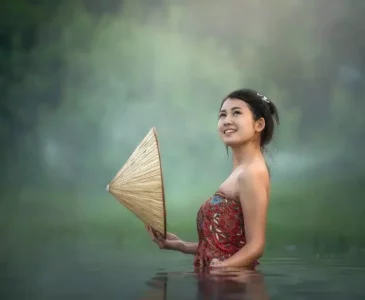young woman standing in water