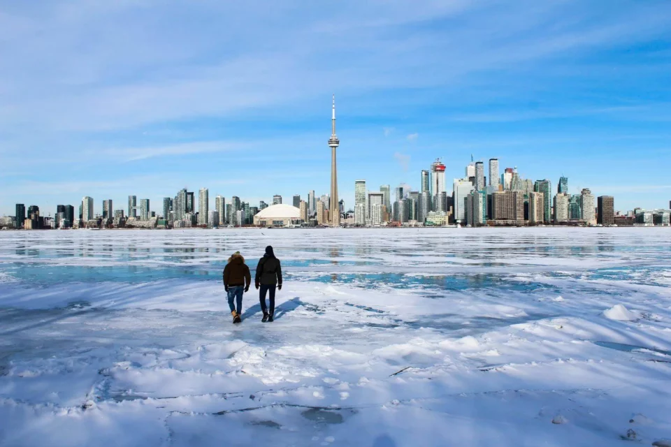 People are walking on a frozen lake in TO