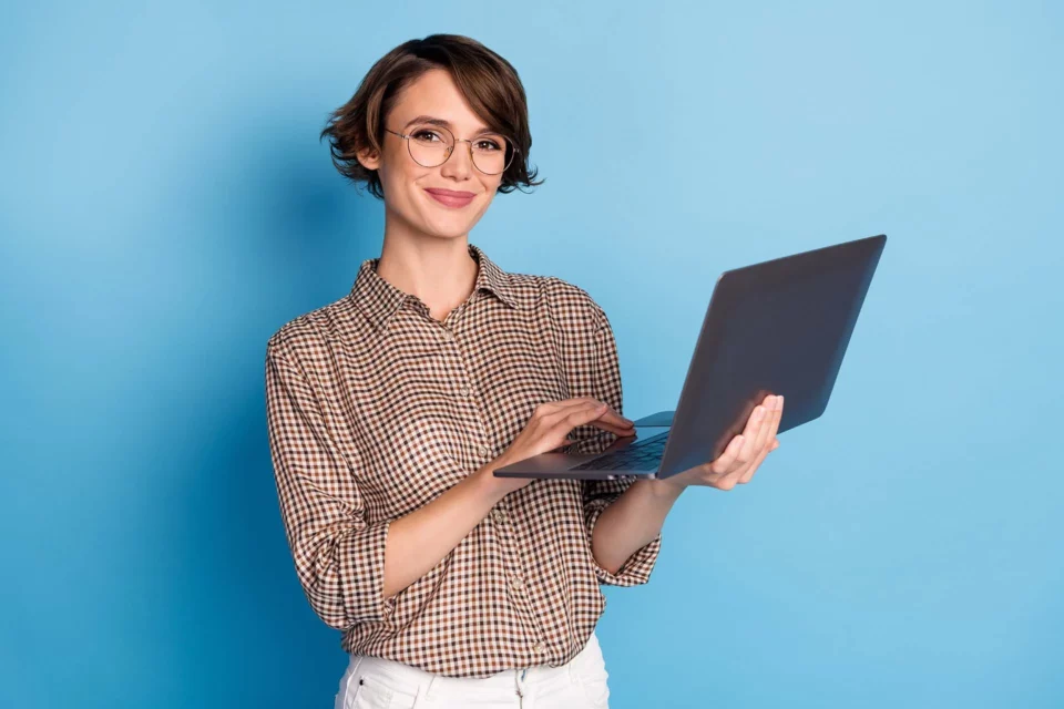 girl holding a laptop